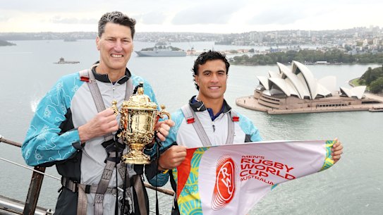 John Eales and Joseph-Aukuso Suaalii on top of the Sydney Harbour Bridge, as part of the 2027 Rugby World Cup fixture list release.