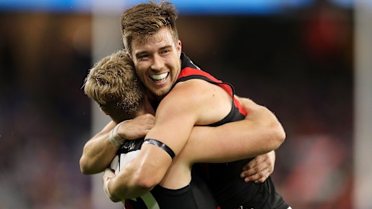 Jake Stringer and Zach Merrett celebrate a goal against the Eagles.