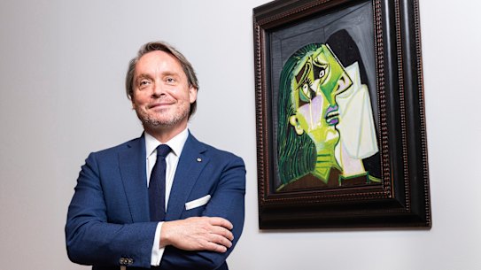 Tony Ellwood, director of the NGV, with The Weeping Woman by Picasso.