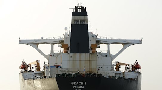 The vessel name and International Maritime Organization (IMO) number is displayed on the bow of impounded Iranian crude oil tanker, Grace 1, as it sits anchored off the coast of Gibraltar, on Saturday, July 20, 2019. Tensions have flared in the Strait of Hormuz in recent weeks as Iran resists U.S. sanctions that are crippling its oil exports and lashes out after the seizure on July 4 of one of its ships near Gibraltar. Photographer: Marcelo del Pozo/Bloomberg