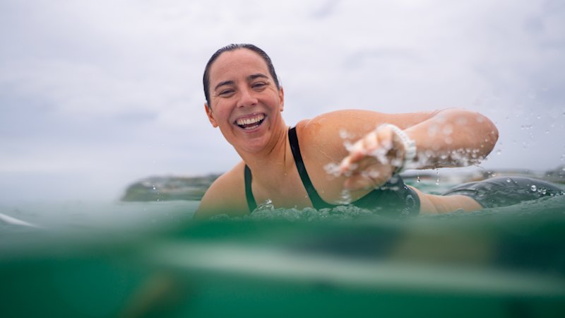 Tyler Wright struggled to sit or stand for months – but surfing keeps dragging her back in