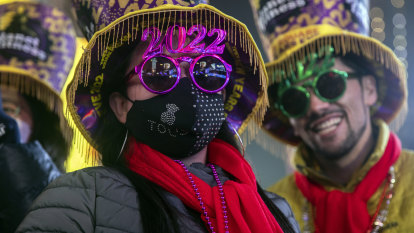 From Times Square to the Red Square, New Year’s celebrations mixed hope and fear