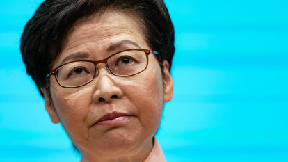 Hong Kong leader urges parents to spy on teens, as bomb plot emerges