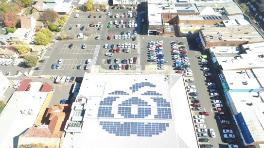 Woolworths' solar panels on a supermarket roof in Orange, NSW.