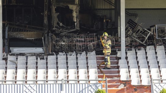A firefighter at the scene of the blaze at Caulfield Racecourse on Tuesday.