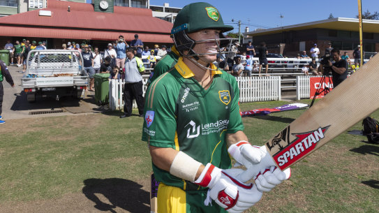 Instant return to form: David Warner was more subdued in his celebrations than when he hit a ton back in September.