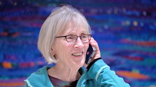 Claudia Goldin speaks to a reporter on the phone in her home after learning that she received the Nobel Prize in Economics.