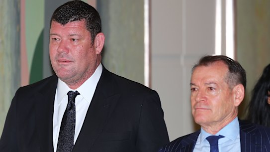 James Packer and John Alexander (right), arrive to attend the Crown Resorts annual general meeting in 2017. Both men have been called to give evidence. 