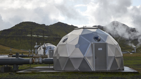 Pods, operated by Carbfix, containing technology for storing carbon dioxide underground, in Hellisheidi, Iceland. Startups Climeworks and Carbfix are working together to store carbon dioxide removed from the air deep underground.