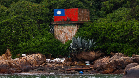 An outpost painted with a Taiwan flag is seen on Da-dan island, where Taiwanese soldiers are stationed, near the maritime boundary with China, in Kinmen, Taiwan.