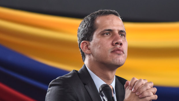 Venezuela's Juan Guaido defies travel ban to woo support abroad