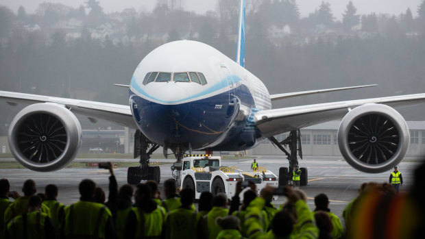 Boeing says pandemic will cut demand for planes for a decade