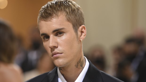 Justin Bieber says he’s working to recover from partial face paralysis