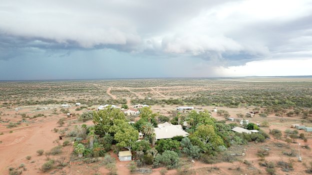 A storm brews over the Wooleen Homestead. 