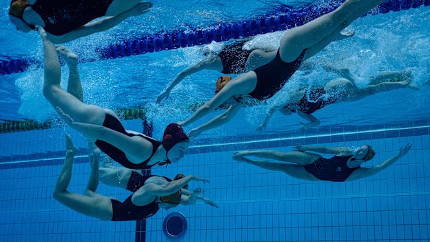 Four sets of sisters line up for UTS Balmain water polo team.