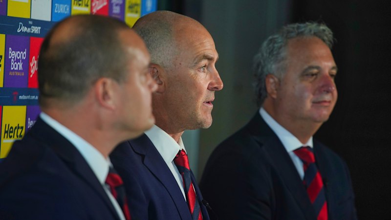 Seven weeks after his retirement party, this veteran footy boss is back to help the Demons