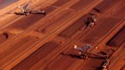 Stackers at the Fortescue facility at Port Hedland. The market expects earnings growth to return to the resources sector, helping keep the ASX at record levels.