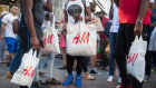 As clothing sales stall, retailers such as H&M are offering customers vouchers if they return textiles for recycling and launching more sustainable collections.
