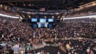 Attendees find their seats during the Berkshire Hathaway annual meeting in Omaha on Saturday.