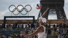 Spain’s Pablo Herrera Allepuz serves during the men’s pool F beach volleyball match between France and Spain at Eiffel Tower Stadium.