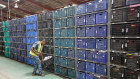 A worker scans inventory inside a Jumia Technologies AG distribution warehouse in Lagos, Nigeria.