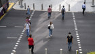 Social distancing at a traffic junction on Orchard Road on March 31, 2020 in Singapore. 