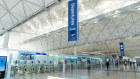 The departure hall at Hong Kong International Airport. Under the new rules, no flights will be allowed from Australia, Britain, Canada, France, India, Pakistan, the Philippines or the United States for two weeks.