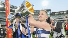 Cats premiership captain Joel Selwood celebrates on Saturday.