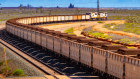 A train loaded with iron ore heads toward the port in Western Australia.