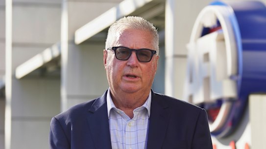 AFL footy operations boss Greg Swann speaks outside AFL House.