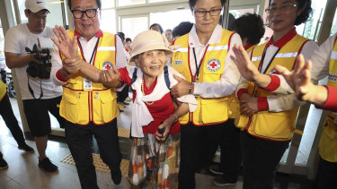 South Korean Lee Geum-seom, 92, arrives to take part in family reunions with her North Korean family members at a hotel in Sokcho, South Korea. She became separated from her husband and son when crossing the border more than 60 years ago with their daughter. She hasn't seen them since.