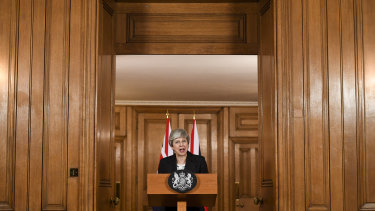 UK Prime Minister Theresa May makes a statement inside number 10 Downing Street. 