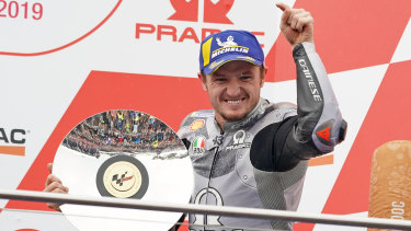 Pride of place: Jack Miller celebrates with silverware after finishing third in the Australian MotoGP at Philip Island.
