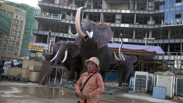 Elephant statues outside a construction site in Sihanoukville, Cambodia, a once-sleepy resort town where locals hope an infusion of Chinese-built infrastructure will pay off with jobs.