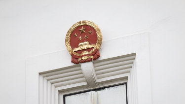 A seal is displayed outside the China Consulate General building in San Francisco.