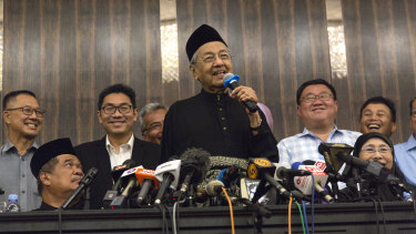 Laughter as prime minister Mahathir Mohamad addresses a news conference on Thursday.