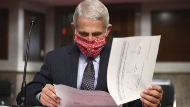 Dr Anthony Fauci prepares to testify before a Senate Health, Education, Labor and Pensions Committee hearing on Capitol Hill in Washington last month.