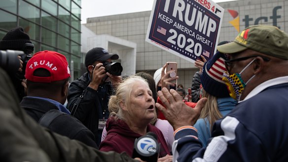 Trump supporters clash with a counter demonstration in Detroit, Michigan.