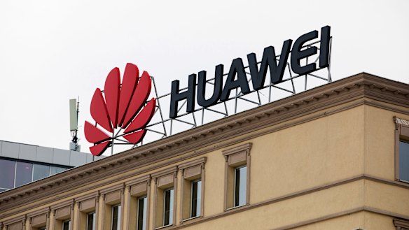 A sign advertises Huawei on a building on a city square in central Skopje, Macedonia.