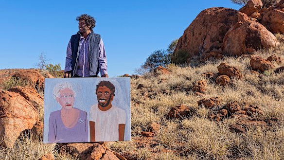 Vincent Namatjira with his work The Queen and Me.