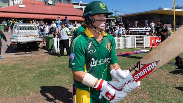 Instant return to form: David Warner was more subdued in his celebrations than when he hit a ton back in September.