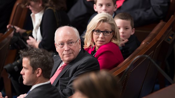Former vice-president Dick Cheney, left, sits with his daughter, then-newly-elected Representative Liz Cheney in 2017.
