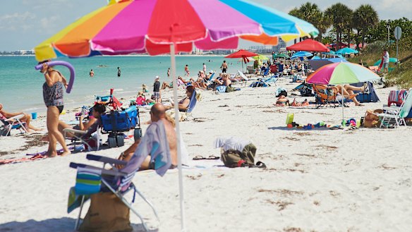 People returned to Clearwater Beach on Florida's Gulf Coast on Monday after all beaches in Pinellas County reopened for the first time in six weeks. 