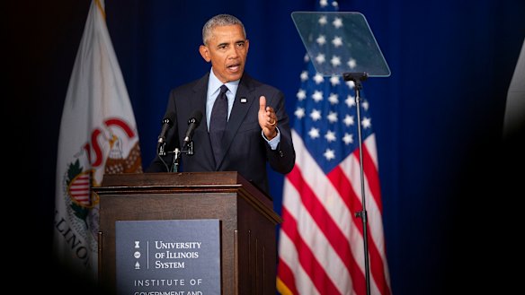 Former president Barack Obama kicked off a campaign blitz against Donald Trump at the University of Illinois in Urbana, on Friday,