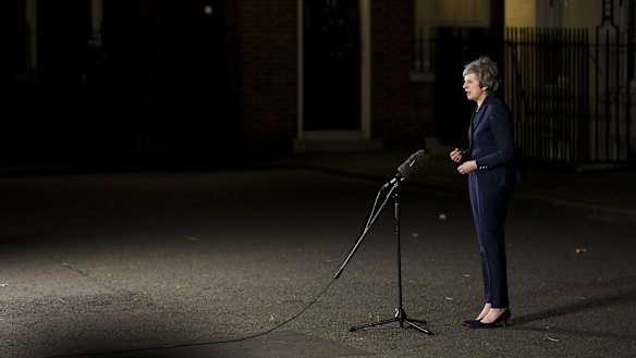 Theresa May delivers a statement outside number 10 Downing St, after surviving the leadership vote.