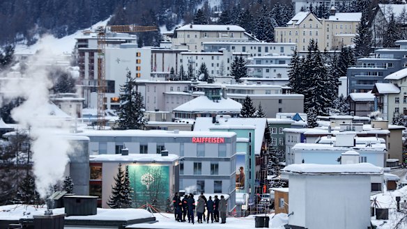 Security personnel stand on a rooftop for a briefing ahead of the World Economic Forum in Davos, Switzerland. Europeans are waiting to see if Donald Trump reprises his role as 'Tariff Man'.