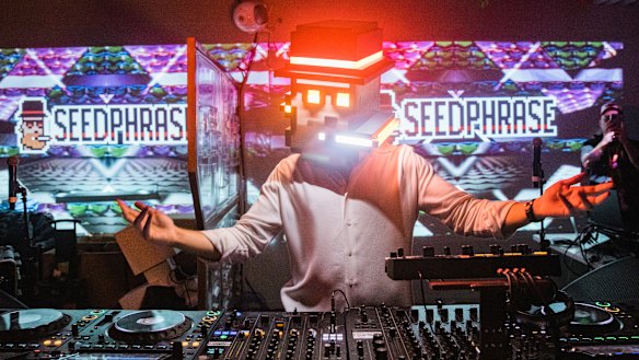 A nonfungible token collector, Seedphrase, the DJ for a set at VR World in Manhattan.