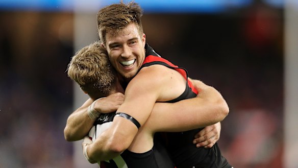 Zach Merrett (right).