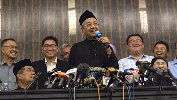 Laughter as prime minister Mahathir Mohamad addresses a news conference on Thursday.