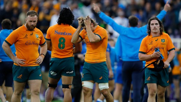 Wallabies players after their one-point defeat to Italy.